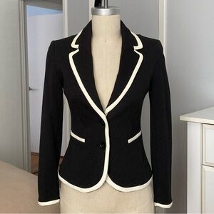 Womans H&M black blazer w/ white trim in size 4
